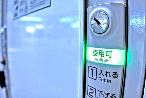 A light on a locker glows green